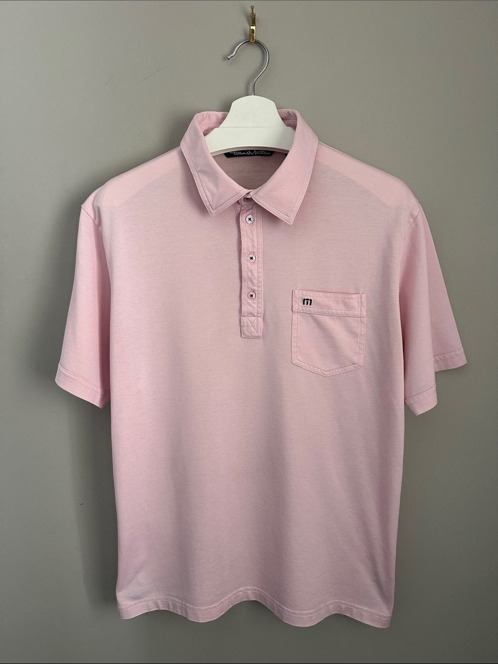 Travis Matthew Light Pink Short-Sleeve Polo with Chest Pocket